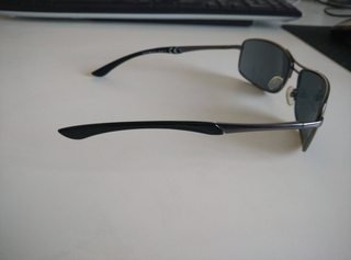 Sunglasses with misaligned arms